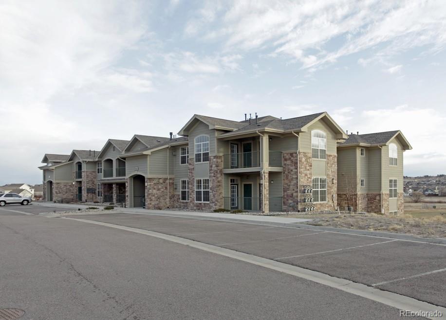 18669 Stroh Road, Unit 10204 Parker, CO 80134 - Photo 28 of 28 a view of an houses with a street
