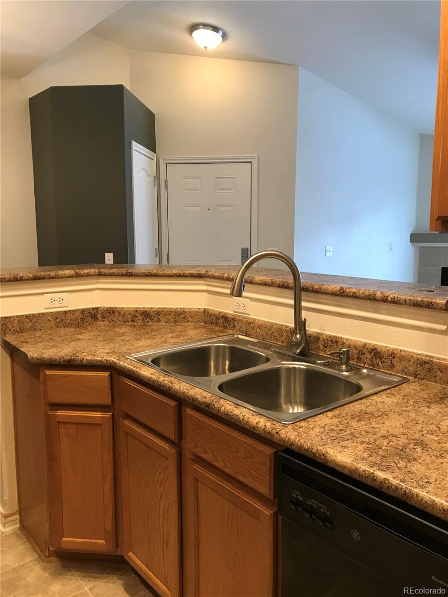 18669 Stroh Road, Unit 10204 Parker, CO 80134 - Photo 5 of 28 a view closed with a granite countertop sink