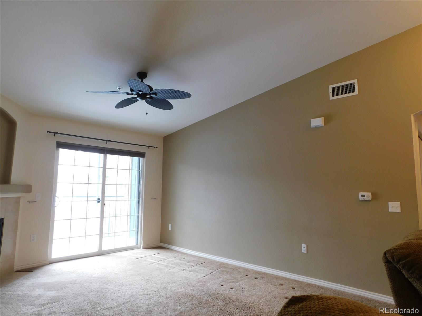 18669 Stroh Road, Unit 10204 Parker, CO 80134 - Photo 10 of 28 a view of an empty room with a window