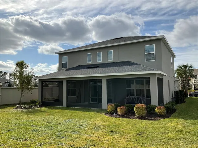 a house with yard in front of it