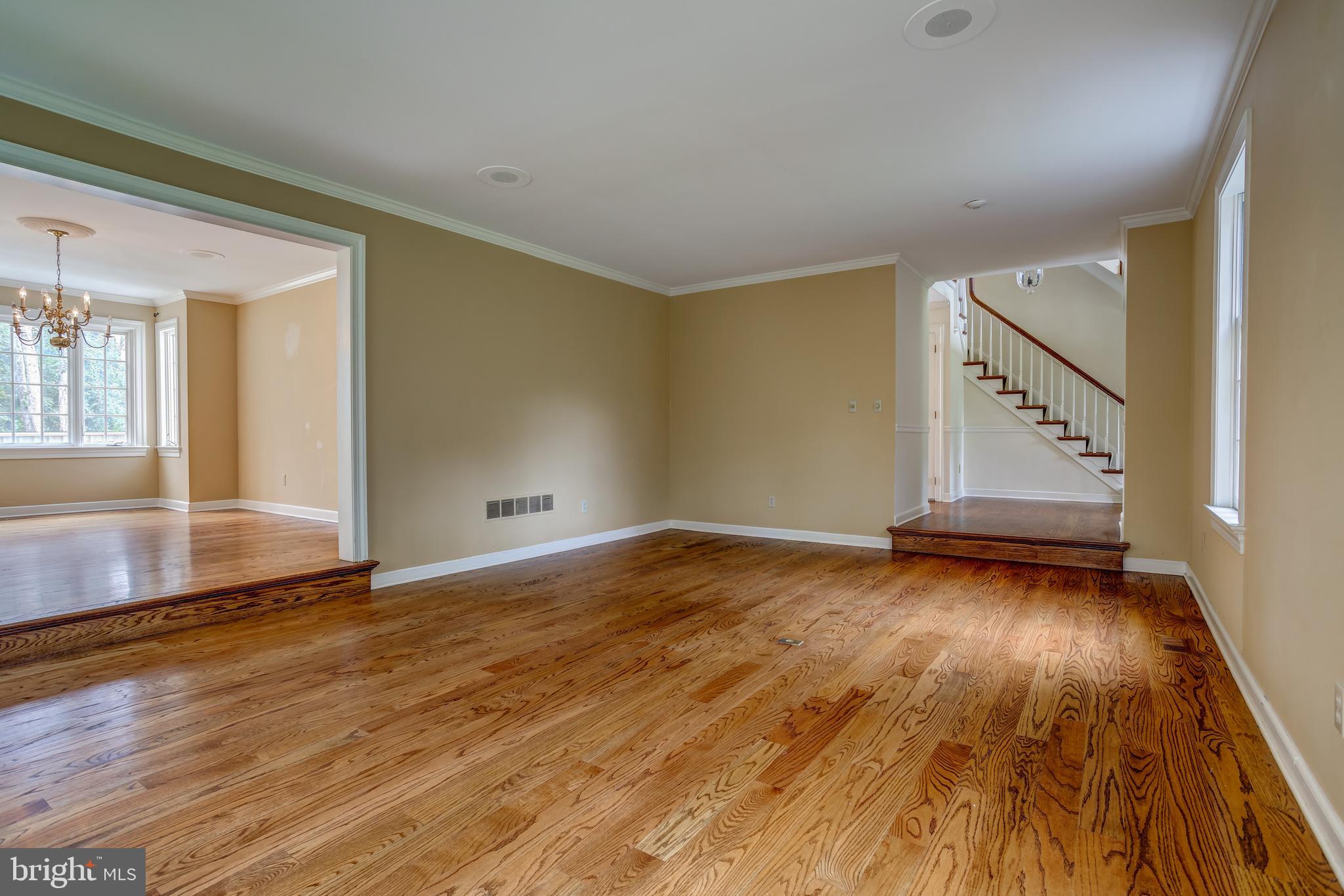 41 Old Covered Bridge Road Newtown Square, PA 19073 - Photo 11 of 58 a view of an empty room with wooden floor and a window