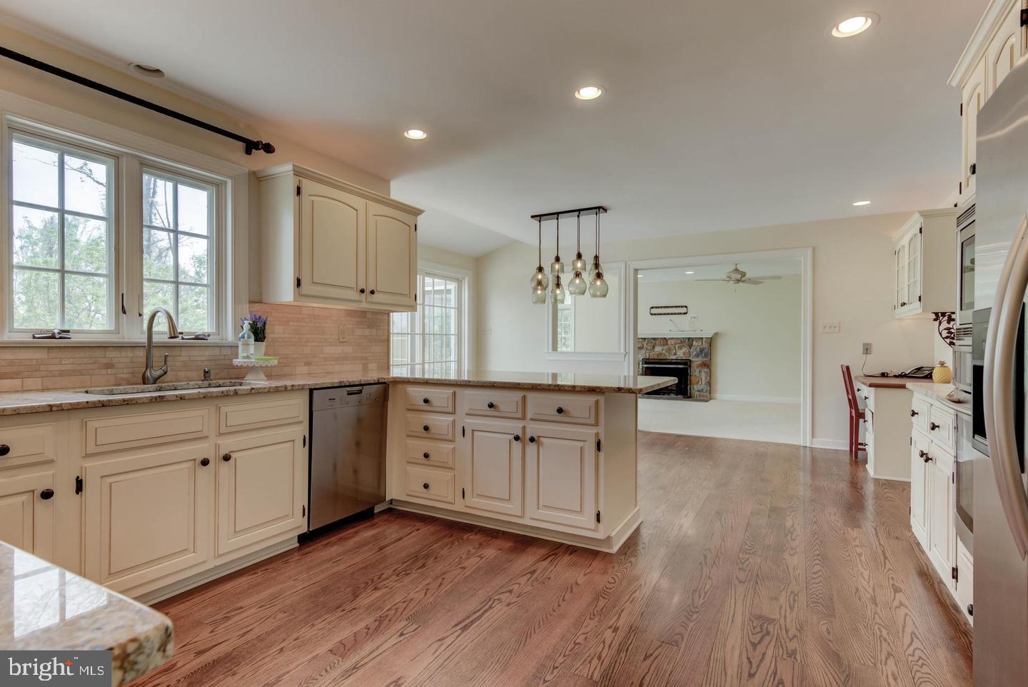 41 Old Covered Bridge Road Newtown Square, PA 19073 - Photo 23 of 58 a kitchen with white cabinets and sink
