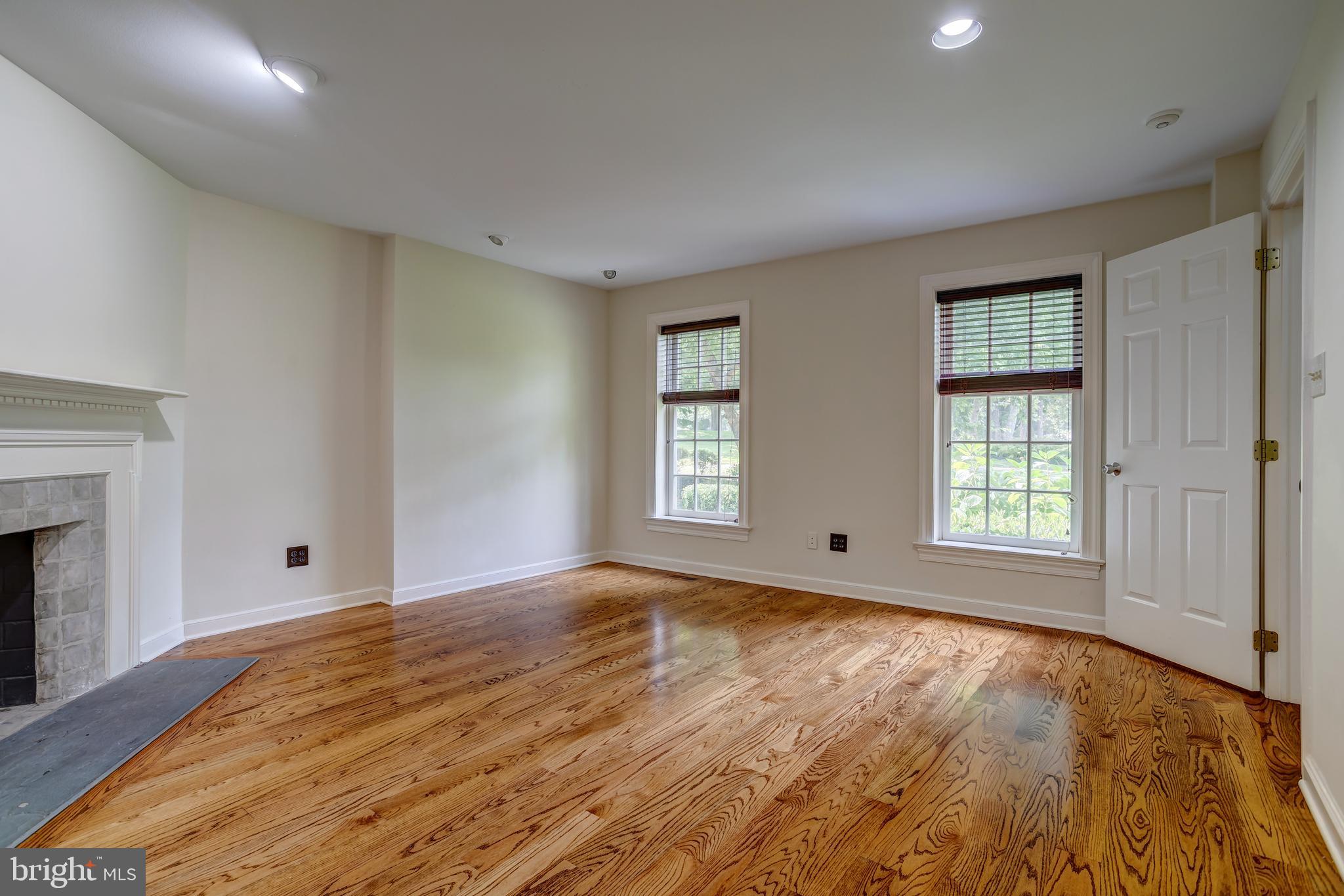 41 Old Covered Bridge Road Newtown Square, PA 19073 - Photo 27 of 58 a view of empty room with wooden floor and fan