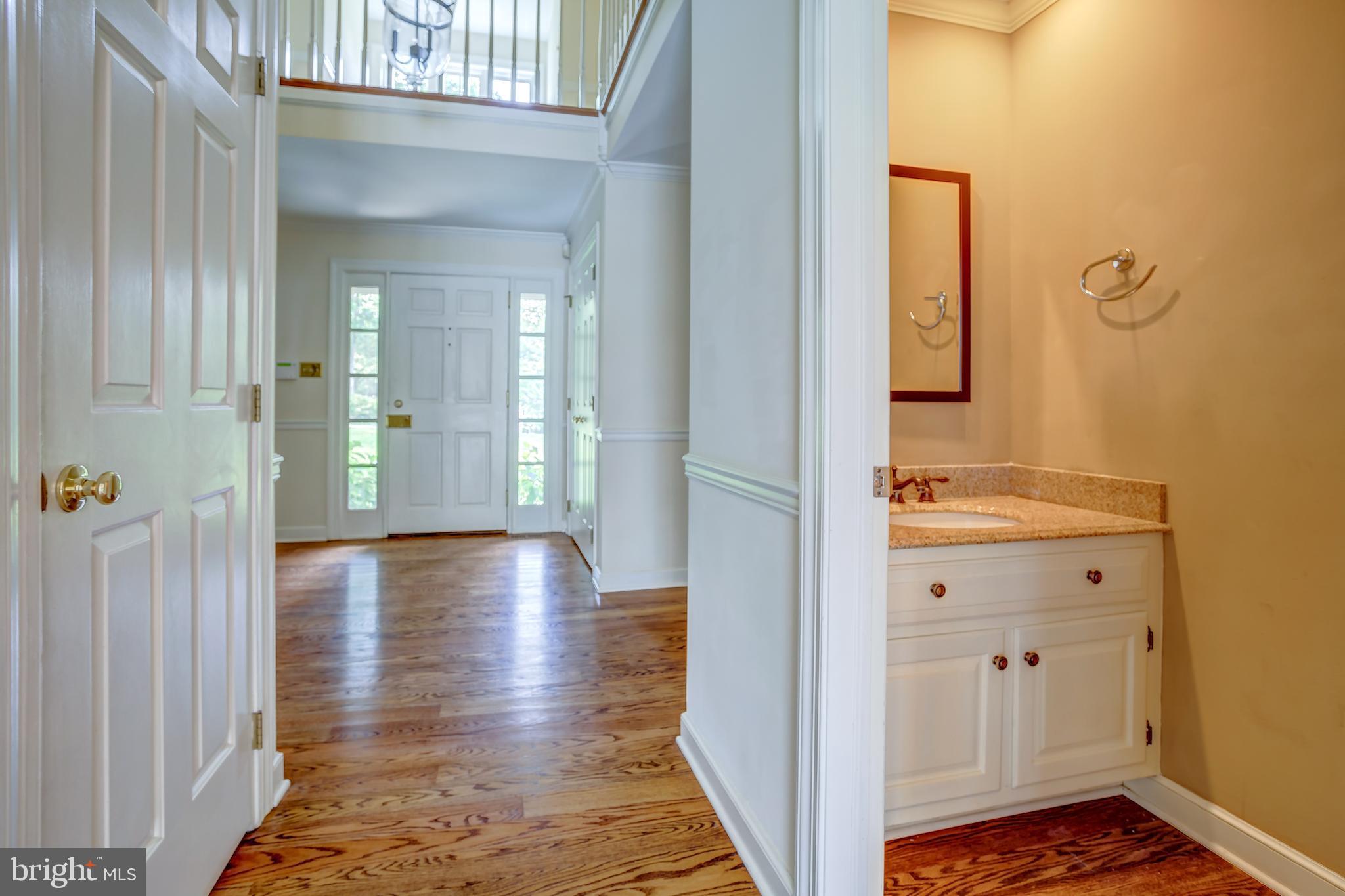 41 Old Covered Bridge Road Newtown Square, PA 19073 - Photo 28 of 58 a view of a hallway with wooden floor