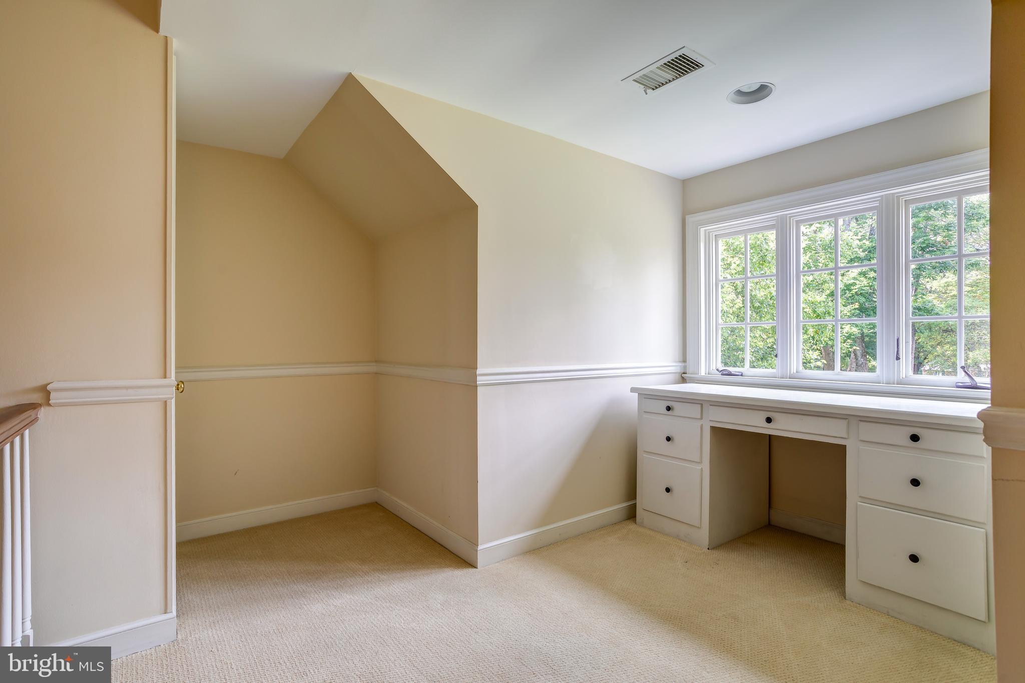 41 Old Covered Bridge Road Newtown Square, PA 19073 - Photo 30 of 58 a kitchen with white cabinets and a window
