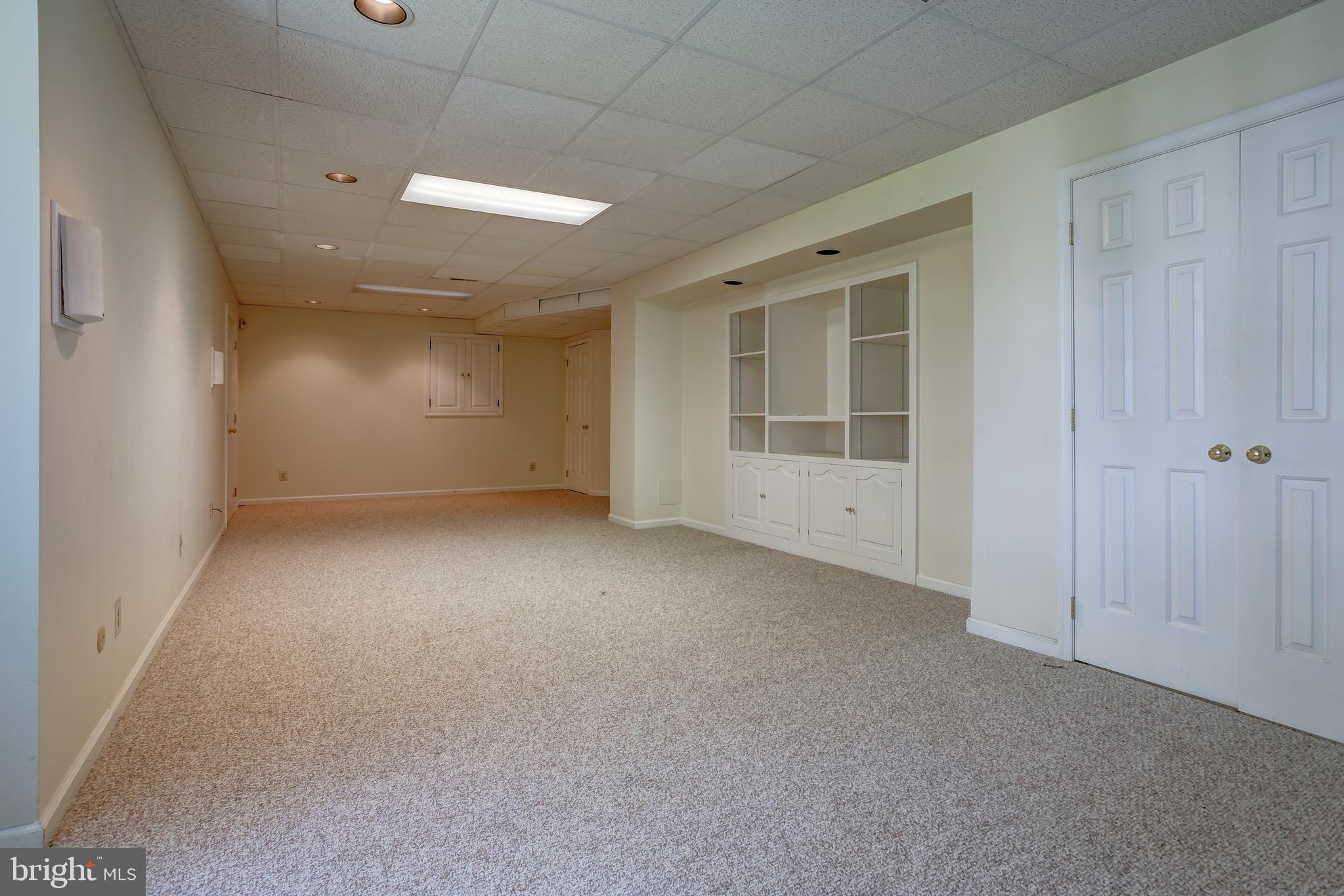 41 Old Covered Bridge Road Newtown Square, PA 19073 - Photo 49 of 58 an empty room with a empty space and windows