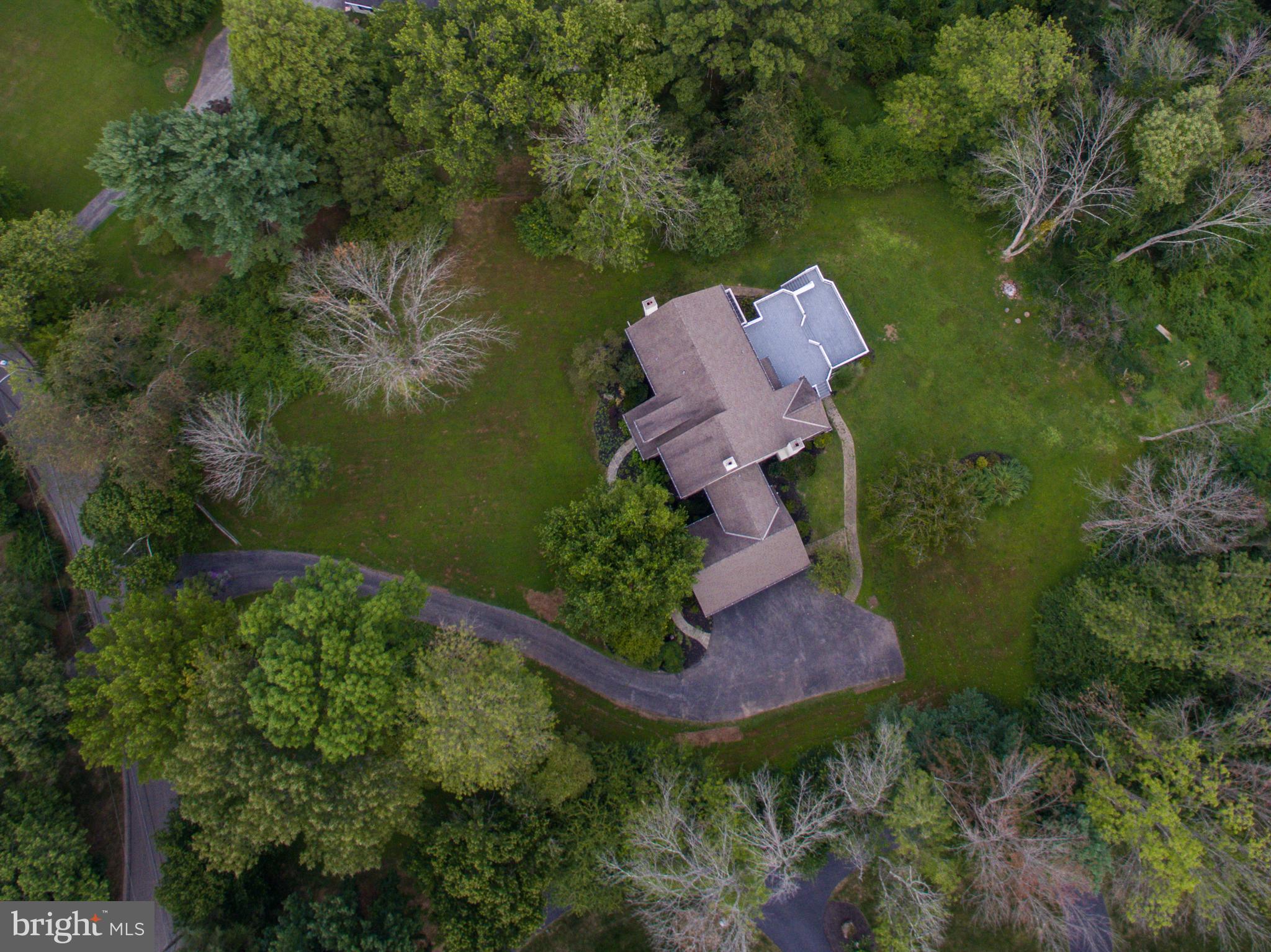 41 Old Covered Bridge Road Newtown Square, PA 19073 - Photo 56 of 58 an aerial view of a house with garden space and lake view