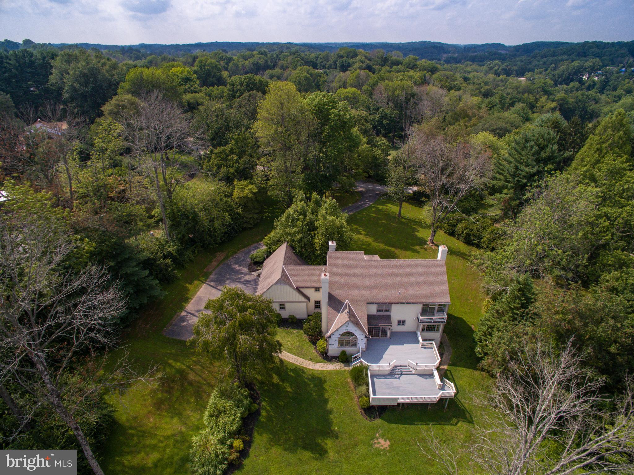 41 Old Covered Bridge Road Newtown Square, PA 19073 - Photo 57 of 58 an aerial view of a house with a garden