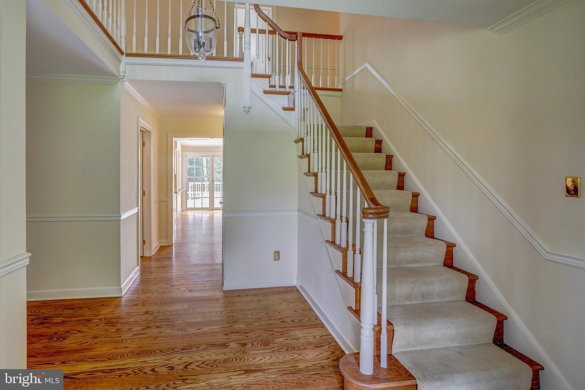 41 Old Covered Bridge Road Newtown Square, PA 19073 - Photo 7 of 58 a view of entryway and hall with wooden floor