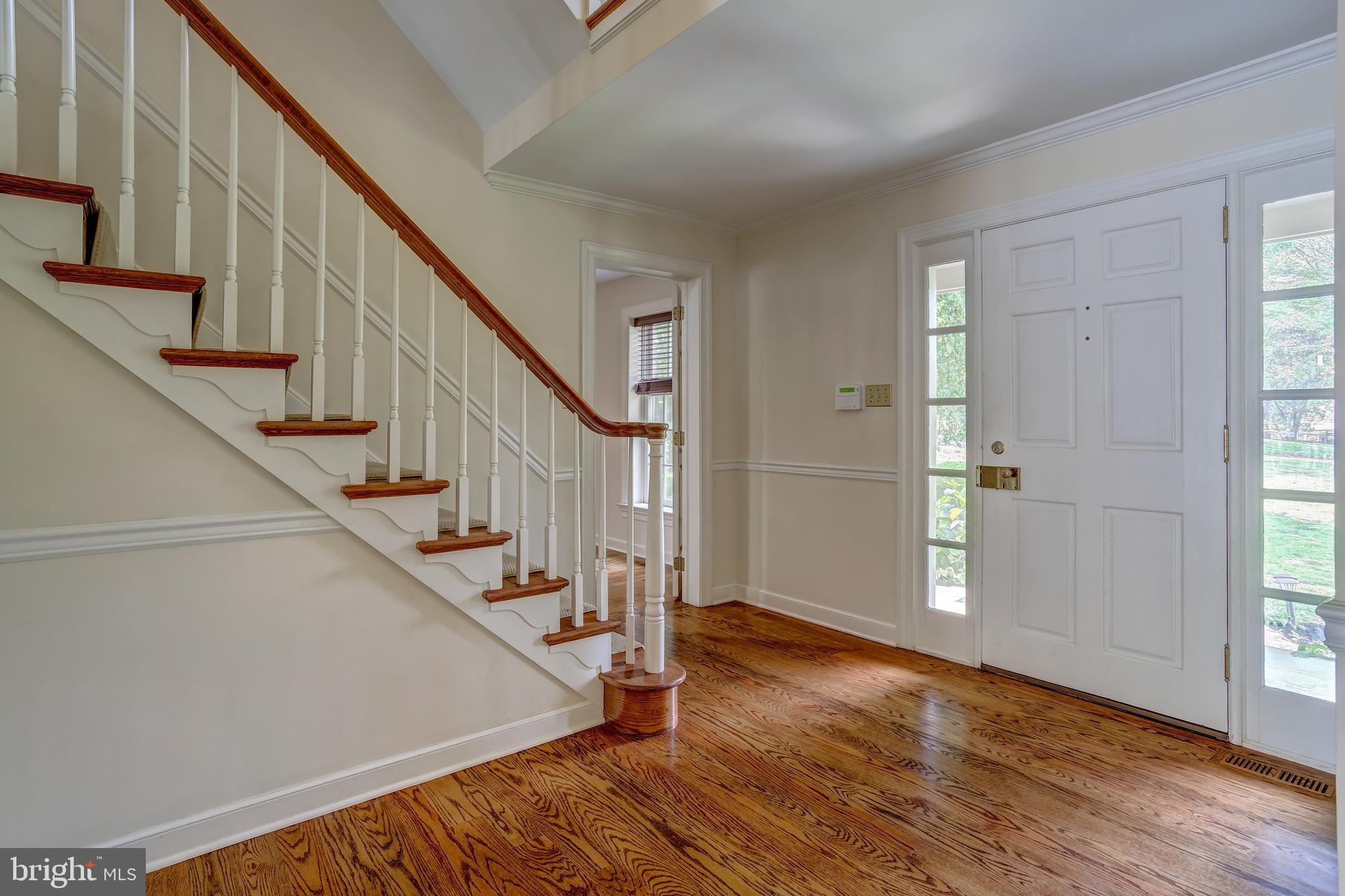 41 Old Covered Bridge Road Newtown Square, PA 19073 - Photo 8 of 58 a view of entryway with wooden floor and stairs