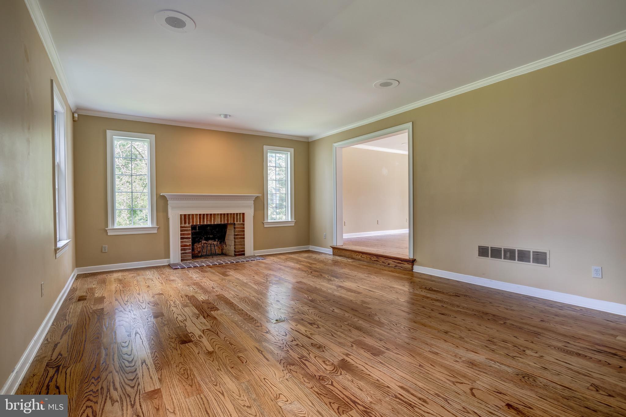 41 Old Covered Bridge Road Newtown Square, PA 19073 - Photo 9 of 58 a view of an empty room with wooden floor and a window