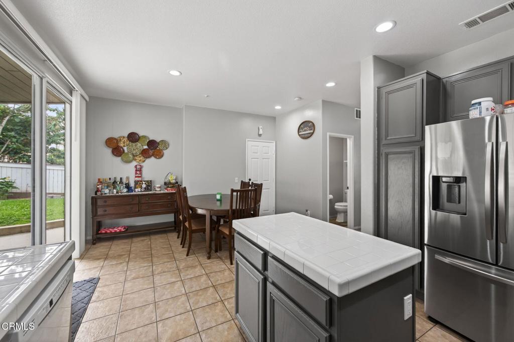 816 Noontide Way Oxnard, CA 93035 - Photo 17 of 41 a kitchen with a refrigerator and a sink