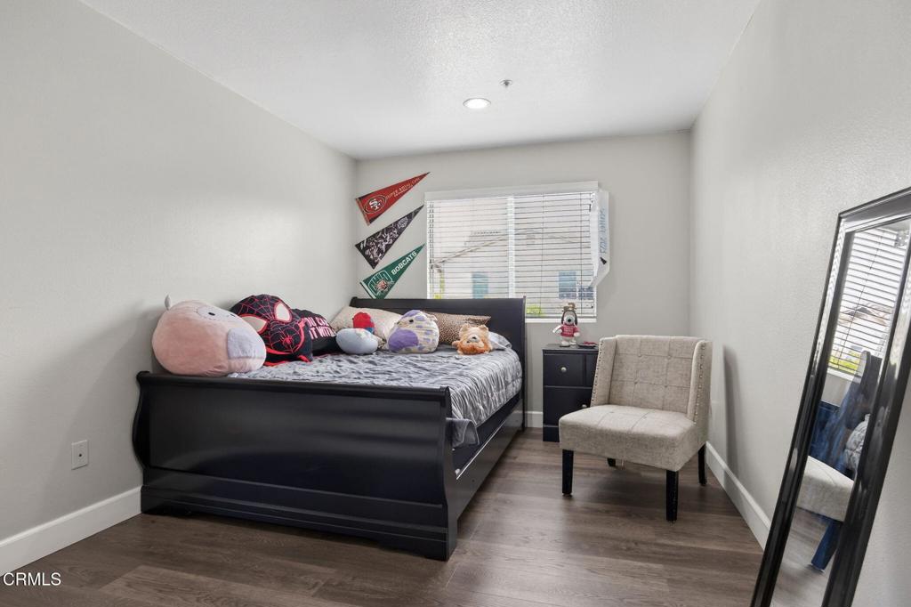 816 Noontide Way Oxnard, CA 93035 - Photo 22 of 41 a bedroom with a bed and a dresser