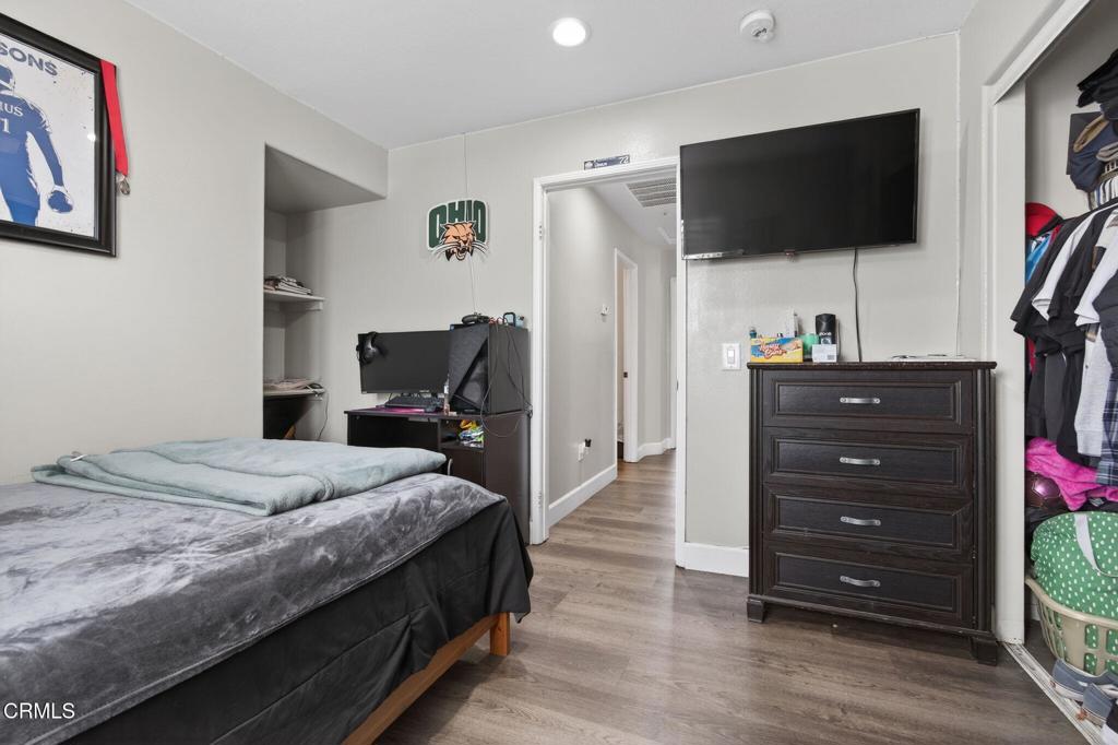 816 Noontide Way Oxnard, CA 93035 - Photo 26 of 41 a bedroom with a bed and a flat screen tv