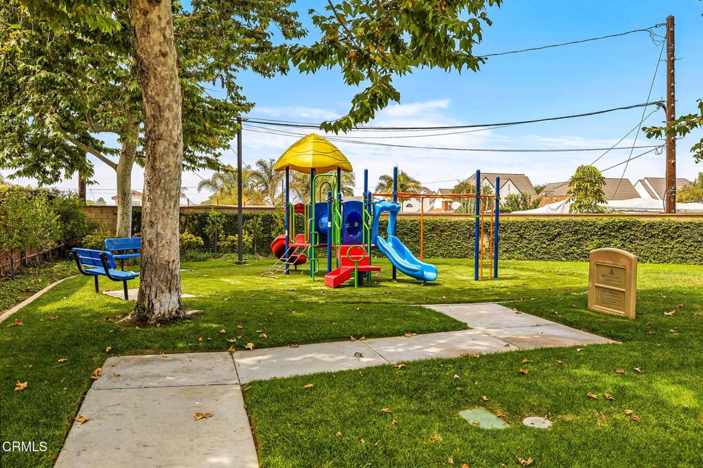 816 Noontide Way Oxnard, CA 93035 - Photo 36 of 41 a view of a park with swings and slides