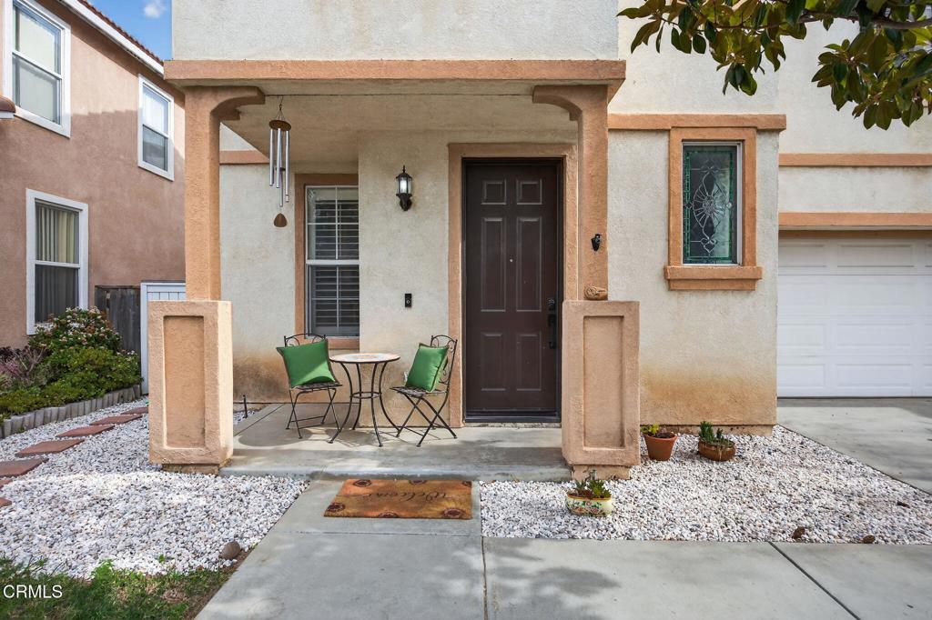 816 Noontide Way Oxnard, CA 93035 - Photo 4 of 41 a front view of a house with a yard