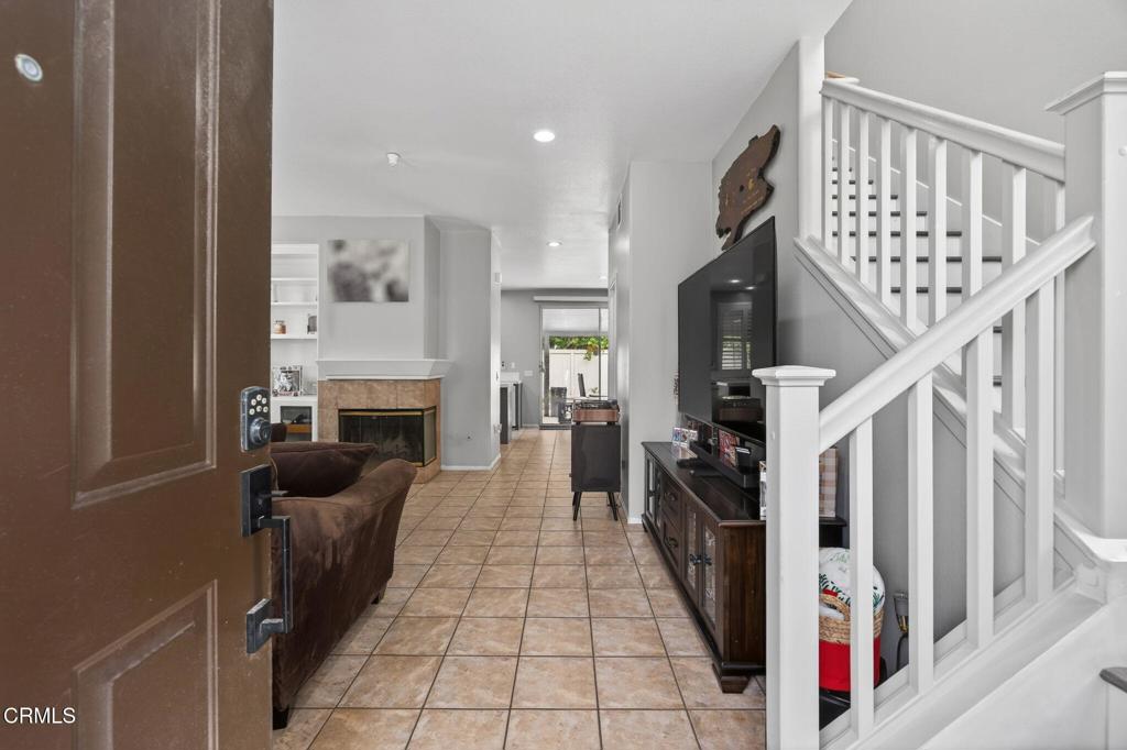 816 Noontide Way Oxnard, CA 93035 - Photo 5 of 41 a hallway with a stove a washer and dryer