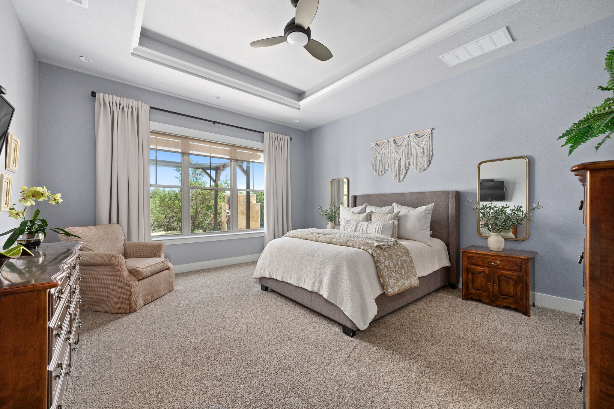 1001 La Cantera Leander, TX 78641 - Photo 16 of 40 a spacious bedroom with a bed and a couch