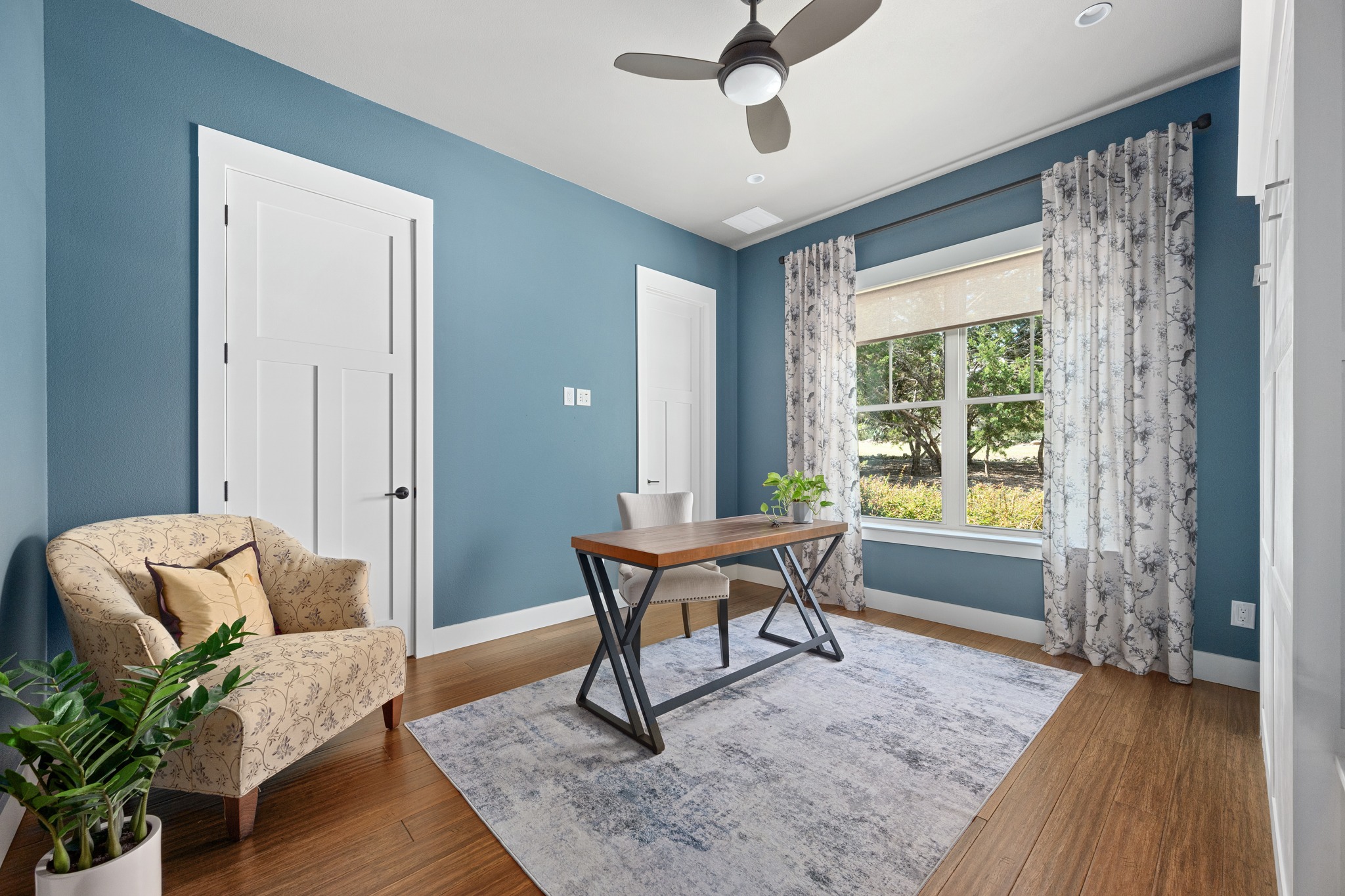 1001 La Cantera Leander, TX 78641 - Photo 20 of 40 a living room with furniture and a window