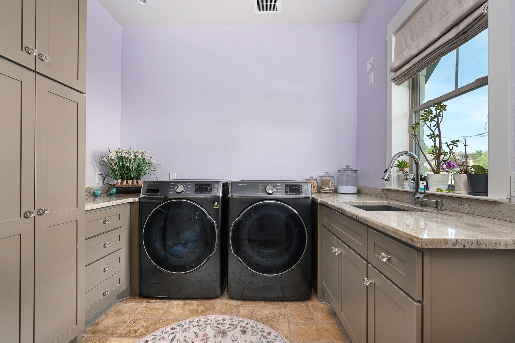 1001 La Cantera Leander, TX 78641 - Photo 26 of 40 a utility room with sink dryer and washer