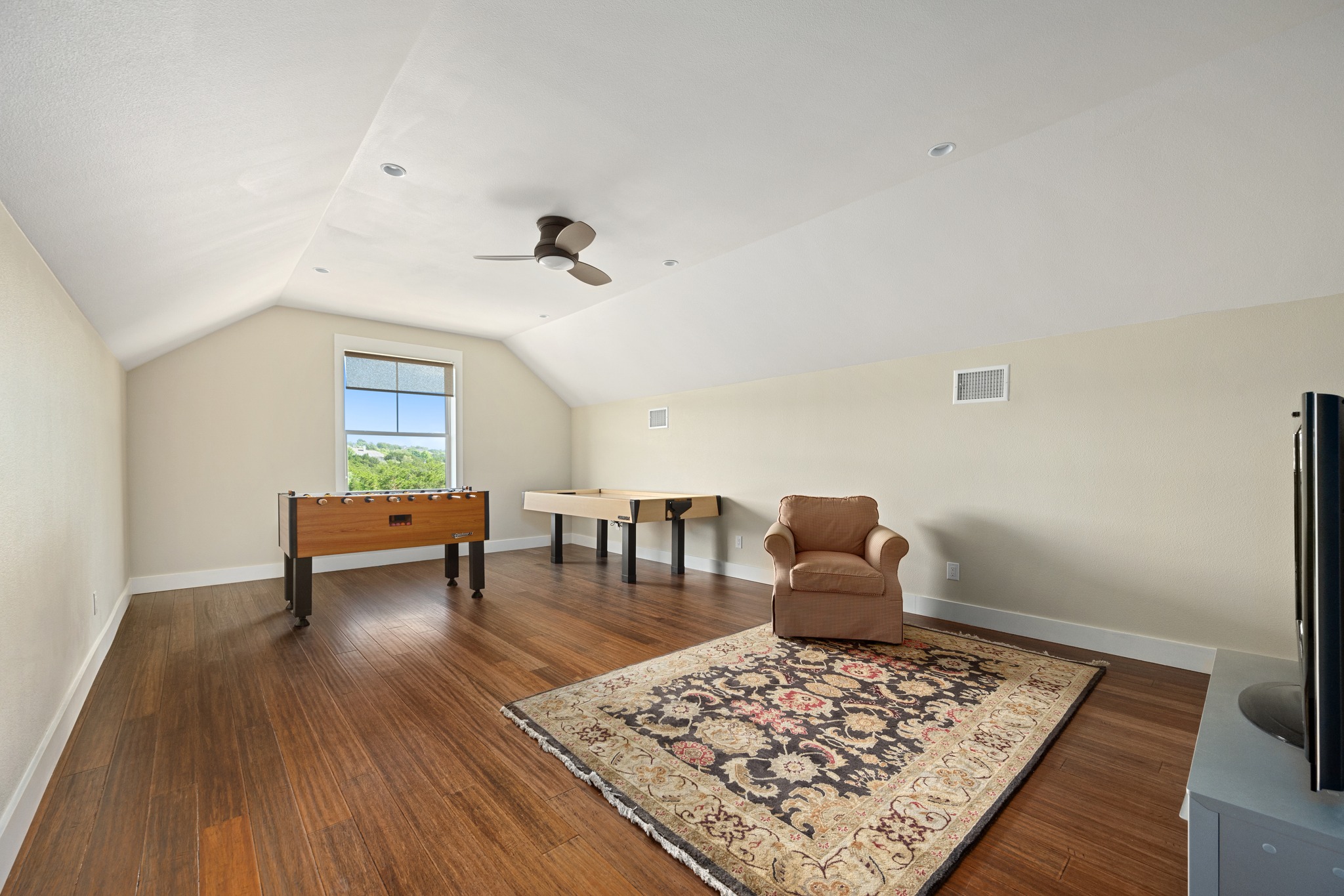 1001 La Cantera Leander, TX 78641 - Photo 27 of 40 a living room with furniture and a rug