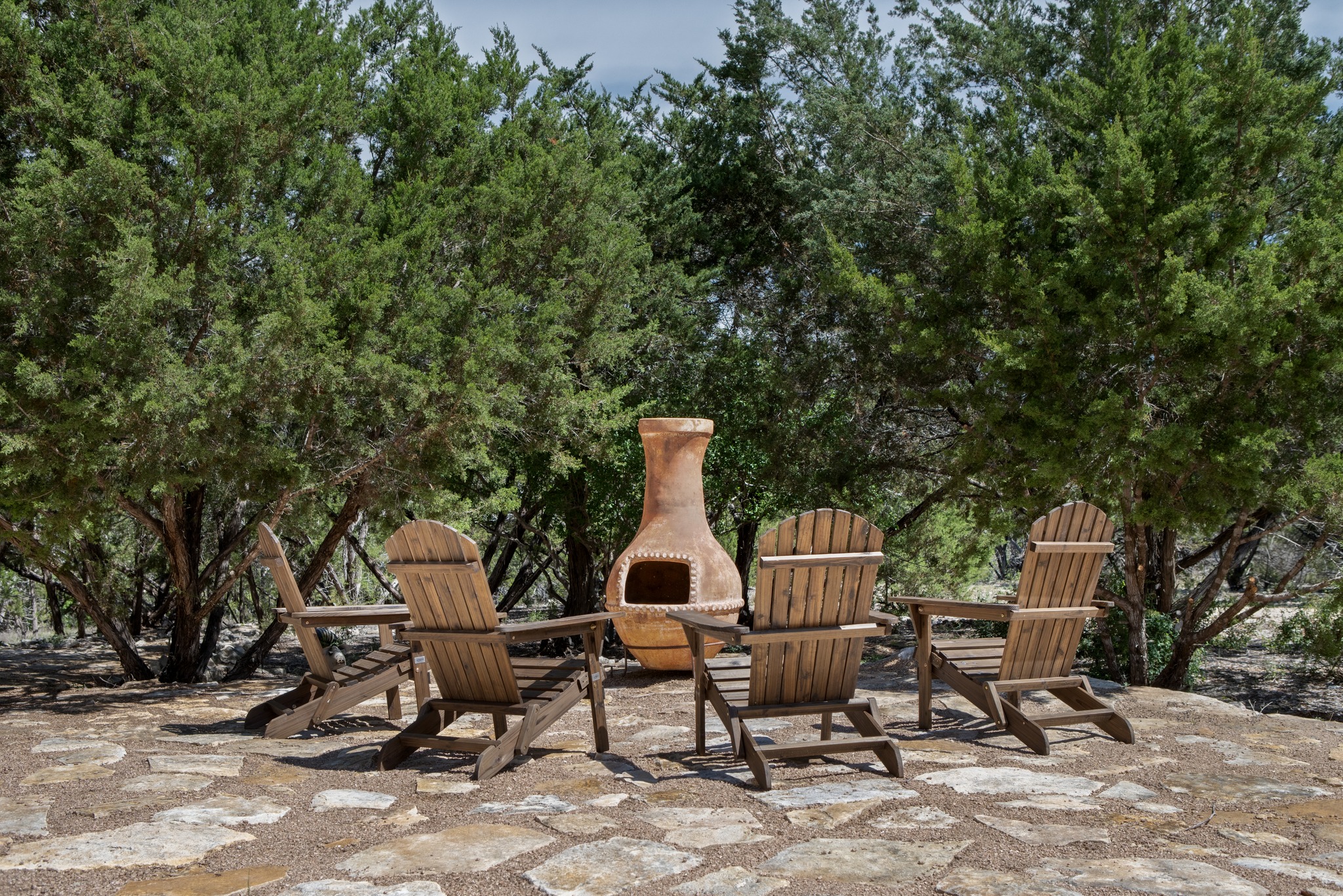 1001 La Cantera Leander, TX 78641 - Photo 32 of 40 a view of a wooden bench sitting in a backyard