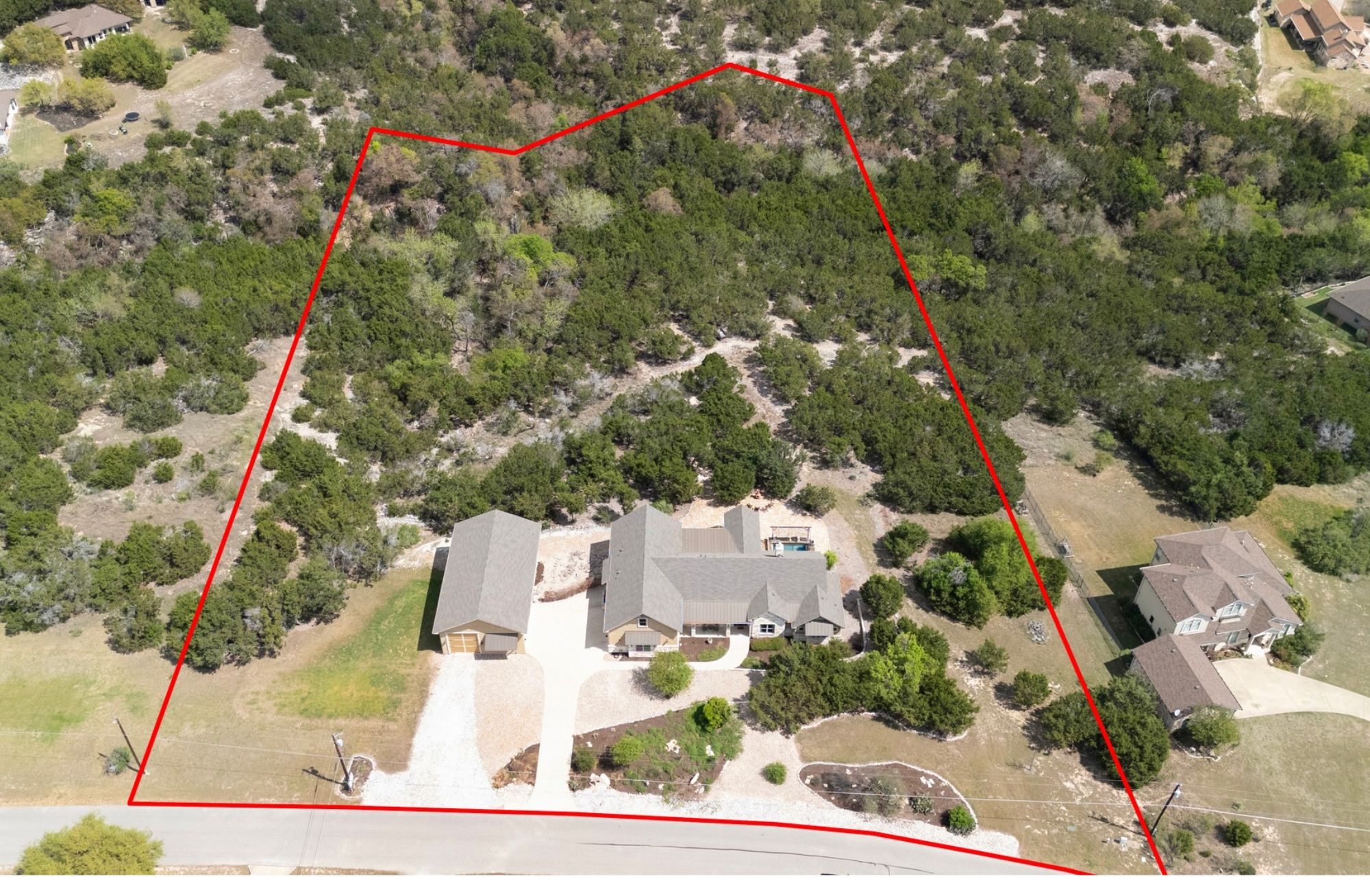 1001 La Cantera Leander, TX 78641 - Photo 37 of 40 an aerial view of residential houses with outdoor space