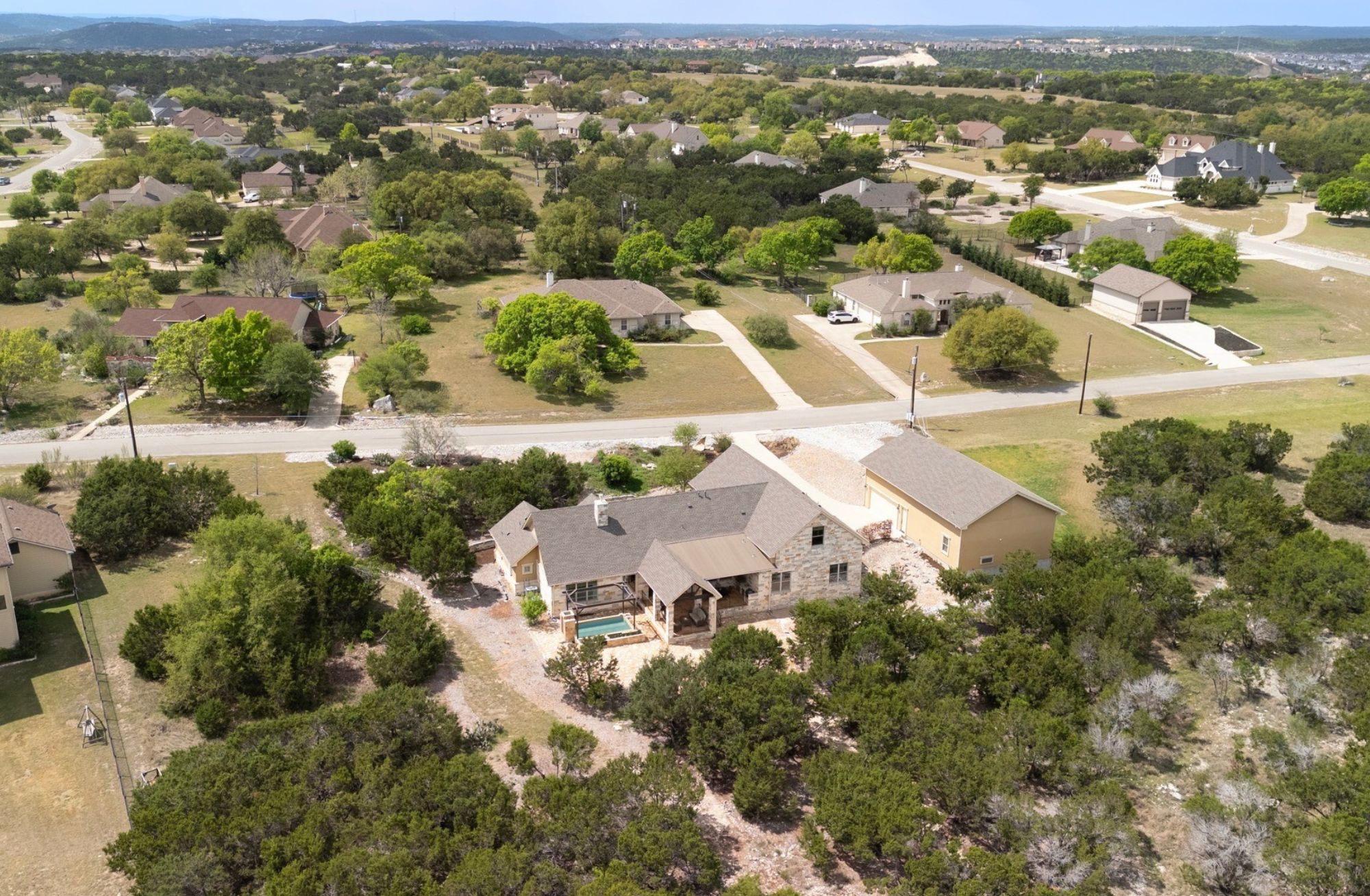 1001 La Cantera Leander, TX 78641 - Photo 38 of 40 an aerial view of residential houses with outdoor space and trees