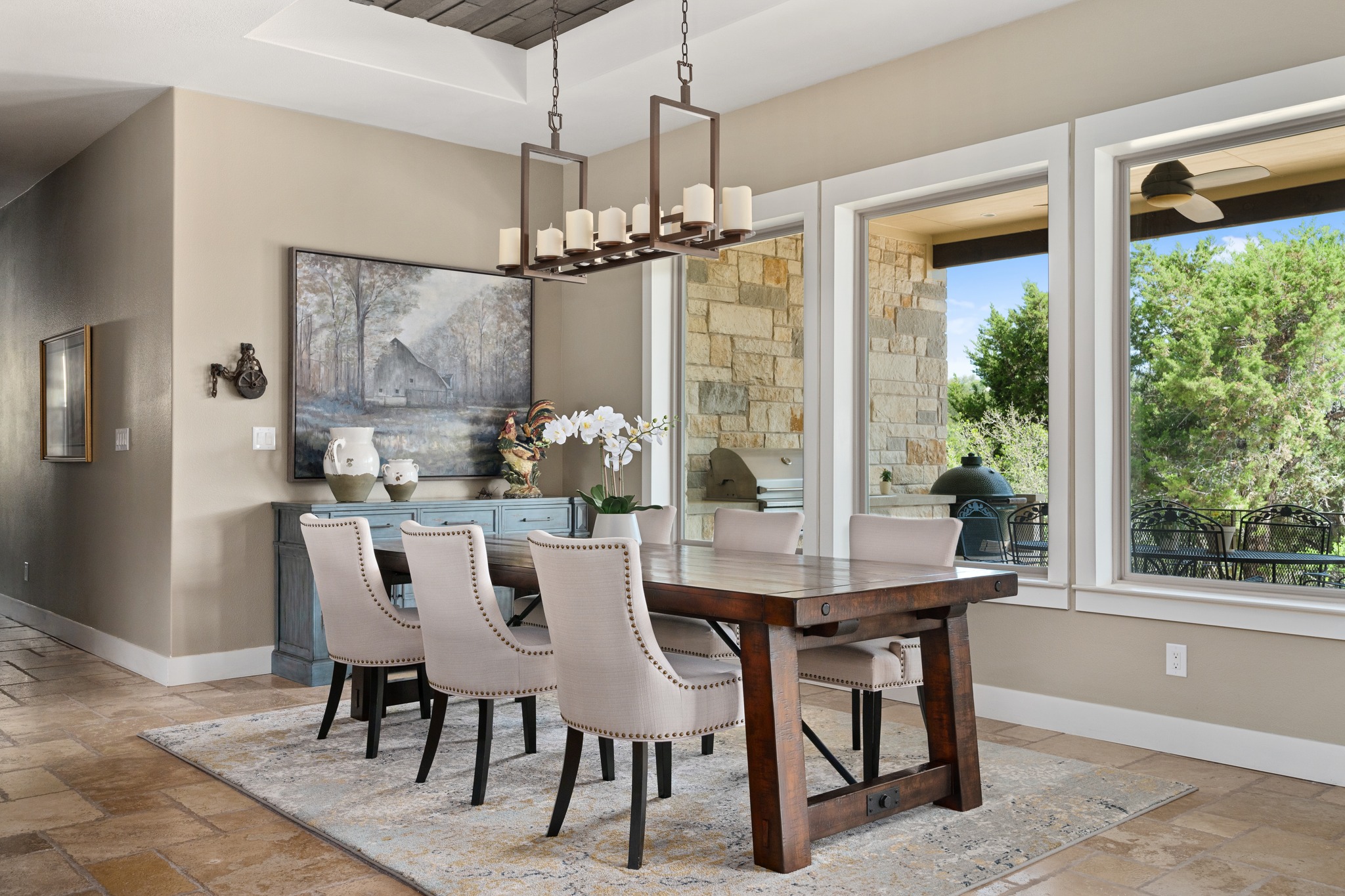 1001 La Cantera Leander, TX 78641 - Photo 8 of 40 a dining room with furniture a chandelier and window