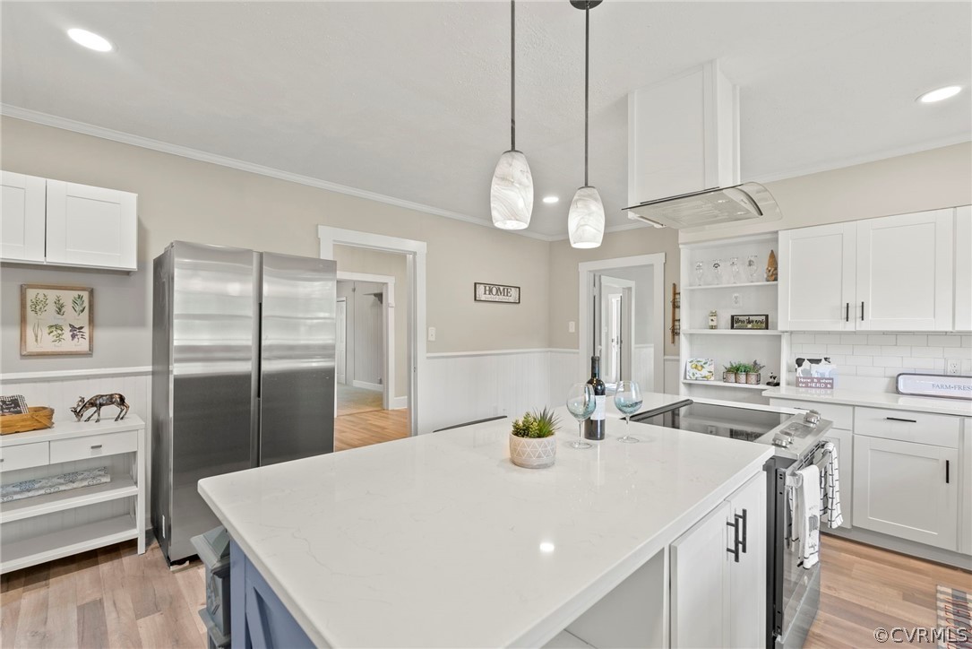 2510 Broad St Road Gum Spring, VA 23065 - Photo 13 of 44 a kitchen that has a lot of cabinets and stainless steel appliances