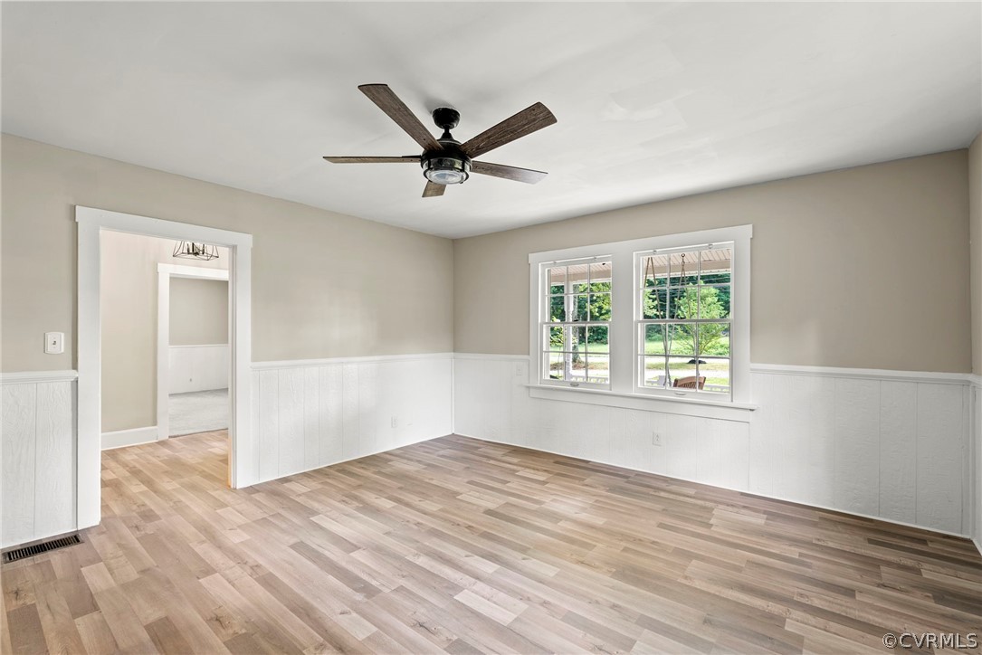 2510 Broad St Road Gum Spring, VA 23065 - Photo 21 of 44 a view of empty room with wooden floor and fan