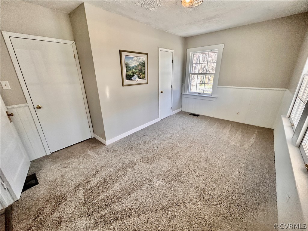 2510 Broad St Road Gum Spring, VA 23065 - Photo 23 of 44 an empty room with windows and closet