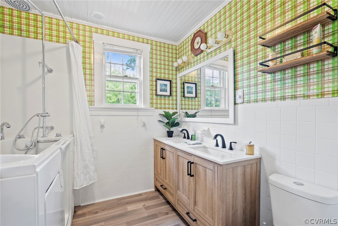2510 Broad St Road Gum Spring, VA 23065 - Photo 28 of 44 a bathroom with a sink a mirror and a shower