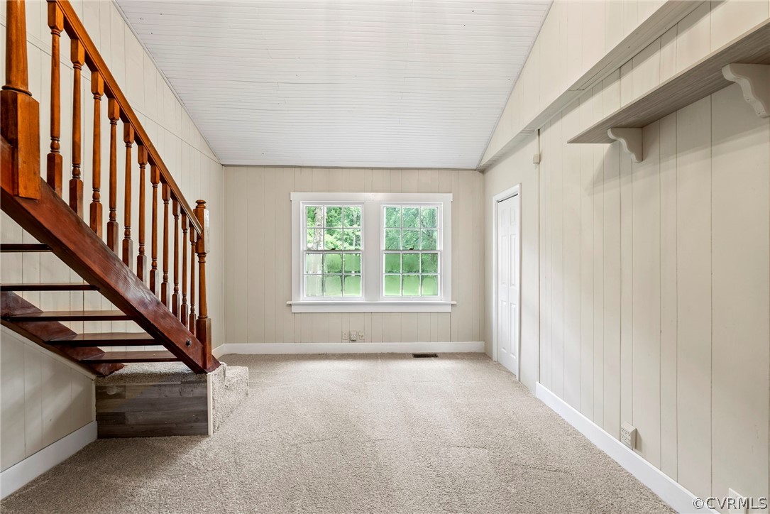 2510 Broad St Road Gum Spring, VA 23065 - Photo 30 of 44 a view of a livingroom with wooden floor and stairs