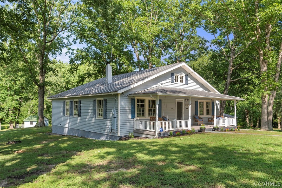 2510 Broad St Road Gum Spring, VA 23065 - Photo 4 of 44 a backyard of a house with yard table and chairs