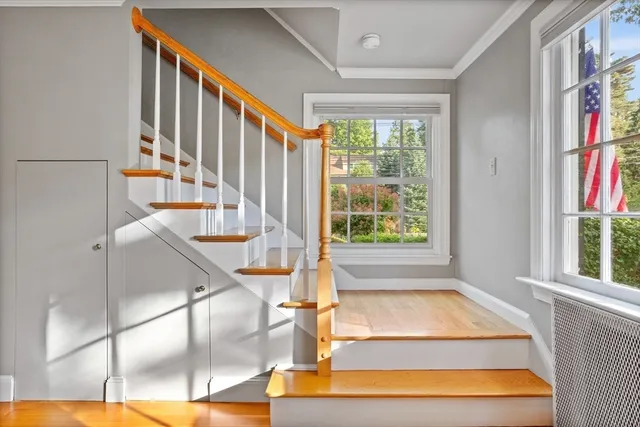 a view of staircase with large window