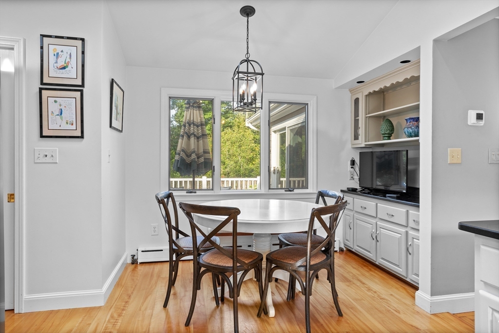 36 Adams Street Lexington, MA 02420 - Photo 4 of 24 a view of a dining room with furniture window and wooden floor