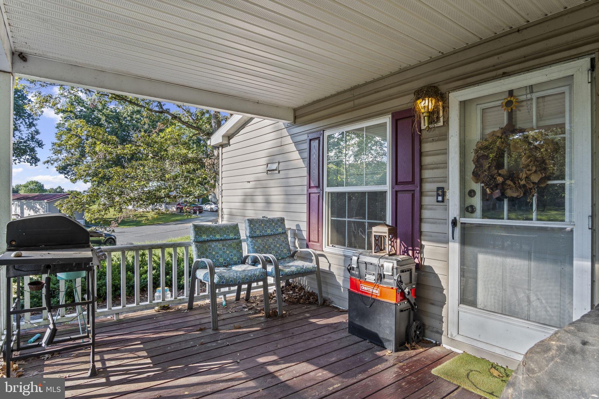 70 Pine Road Newville, PA 17241 - Photo 26 of 27 a balcony with furniture and garden view