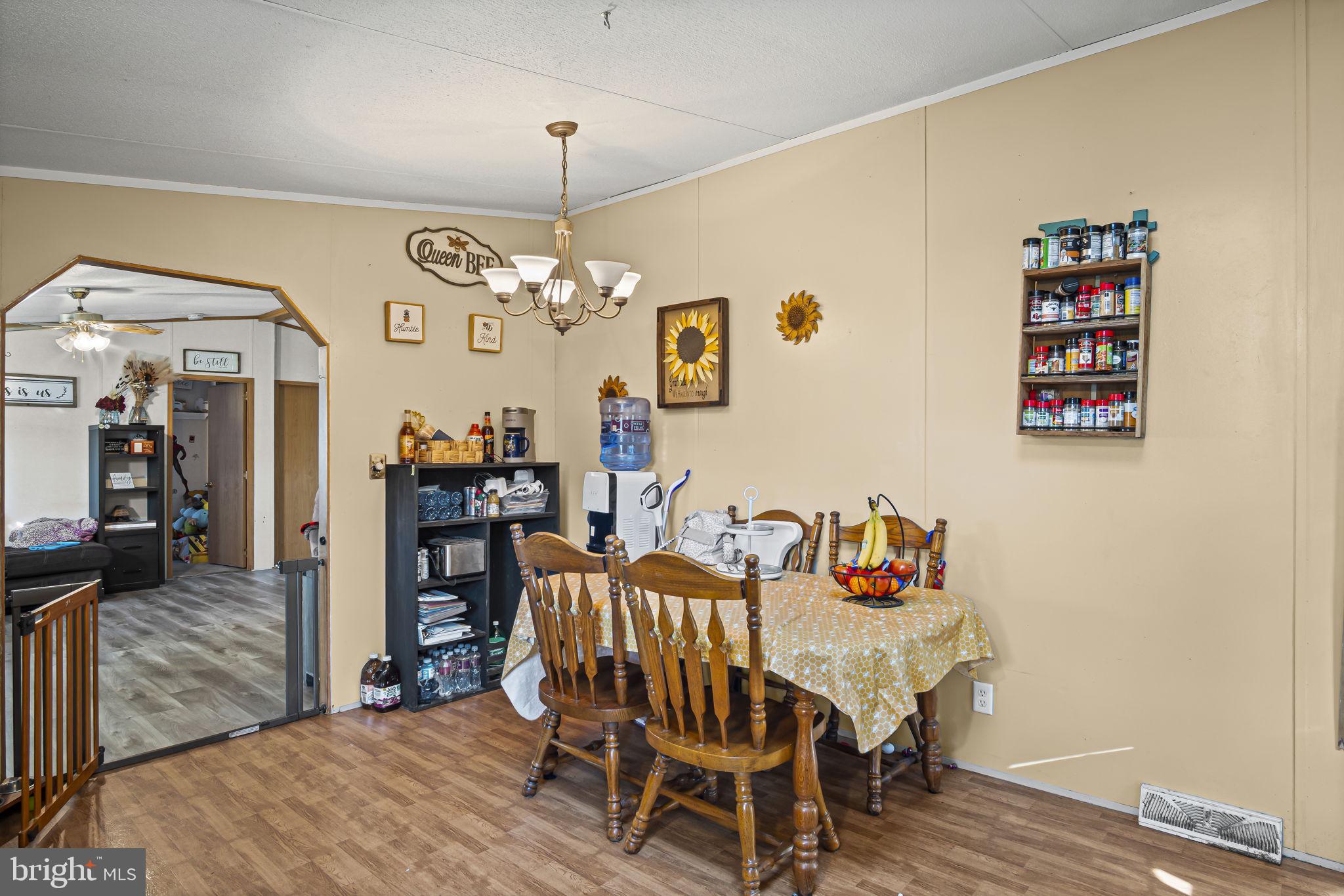 70 Pine Road Newville, PA 17241 - Photo 8 of 27 a view of a dining room with furniture and wooden floor