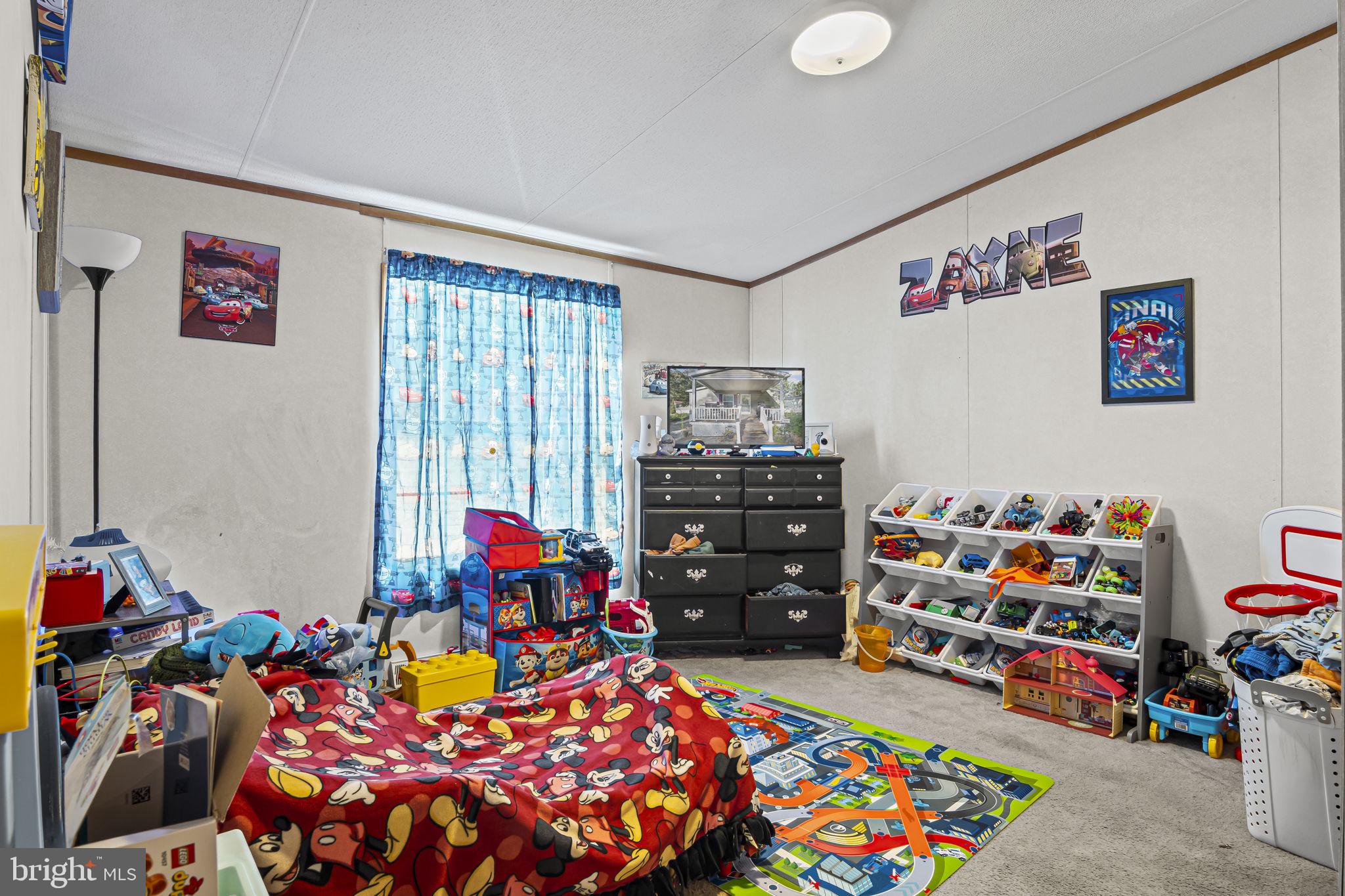 70 Pine Road Newville, PA 17241 - Photo 10 of 27 a bedroom with lots of baby toys and wooden floor