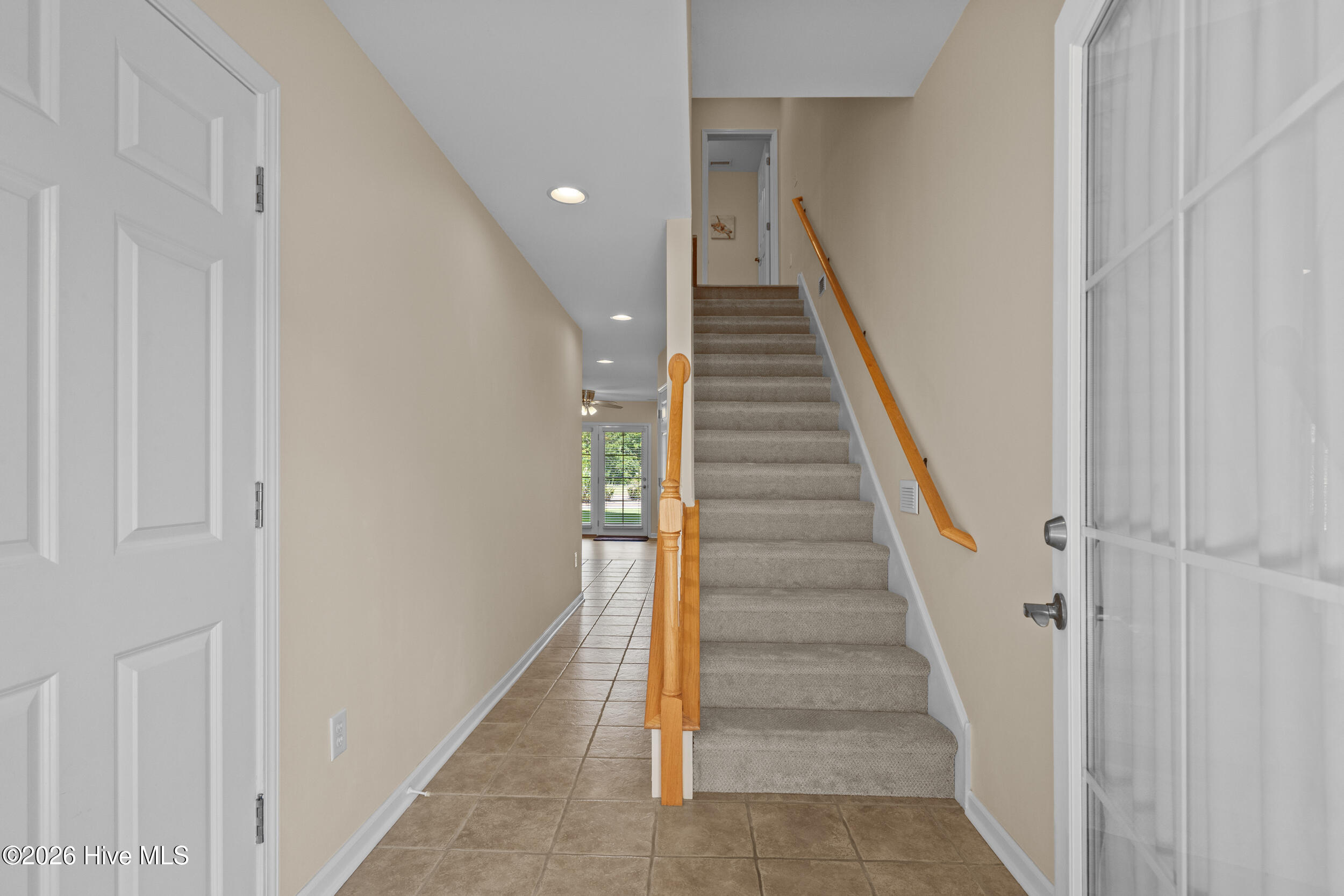 607 River Ridge Road, Unit 1 Shallotte, NC 28470 - Photo 35 of 58 Stairs to the second floor main living area