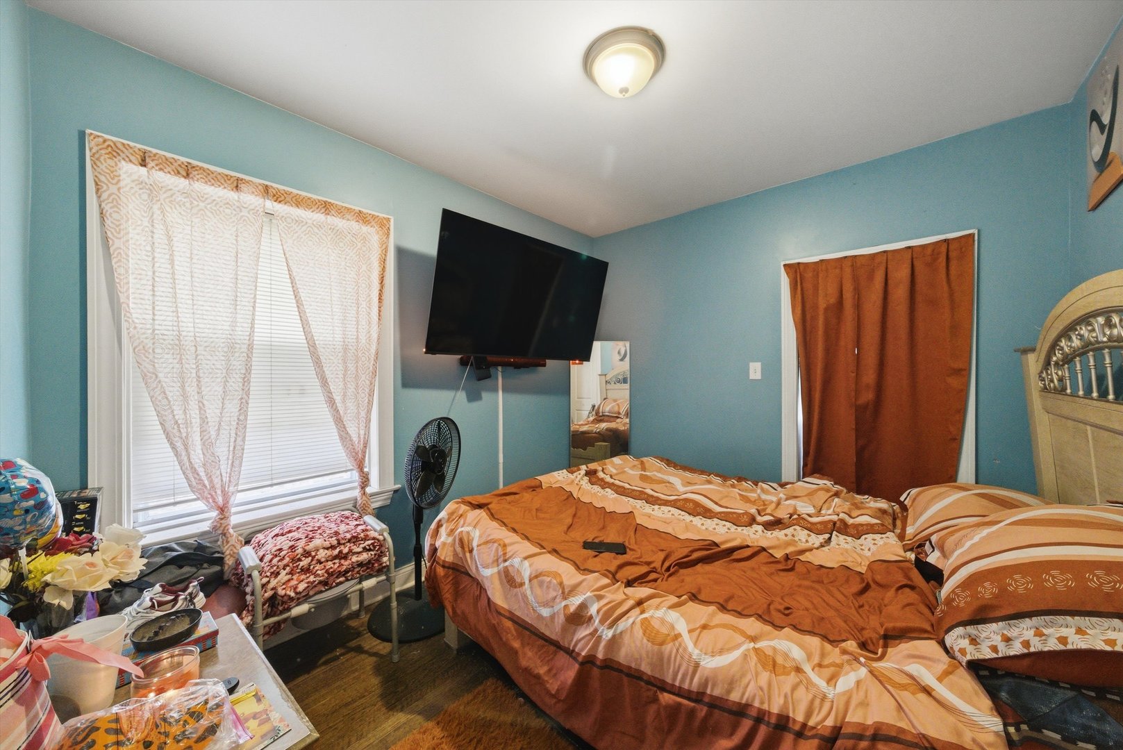 6837 South Morgan Street Chicago, IL 60621 - Photo 13 of 24 a bedroom with double bed and a window