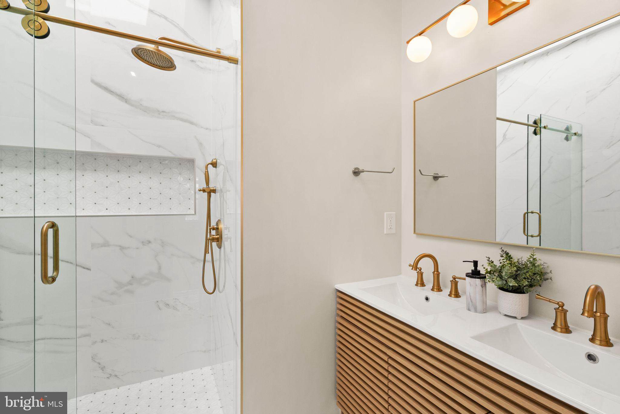 52 S Street Northwest Washington, DC 20001 - Photo 15 of 30 a bathroom with a sink and shower