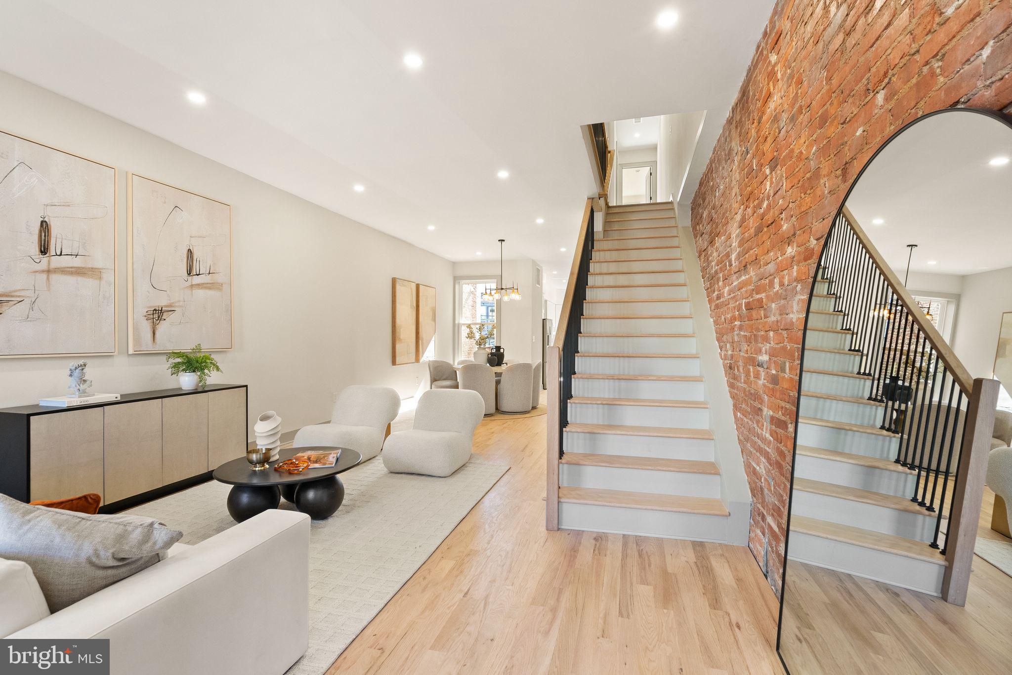52 S Street Northwest Washington, DC 20001 - Photo 2 of 30 a living room with furniture and wooden floor