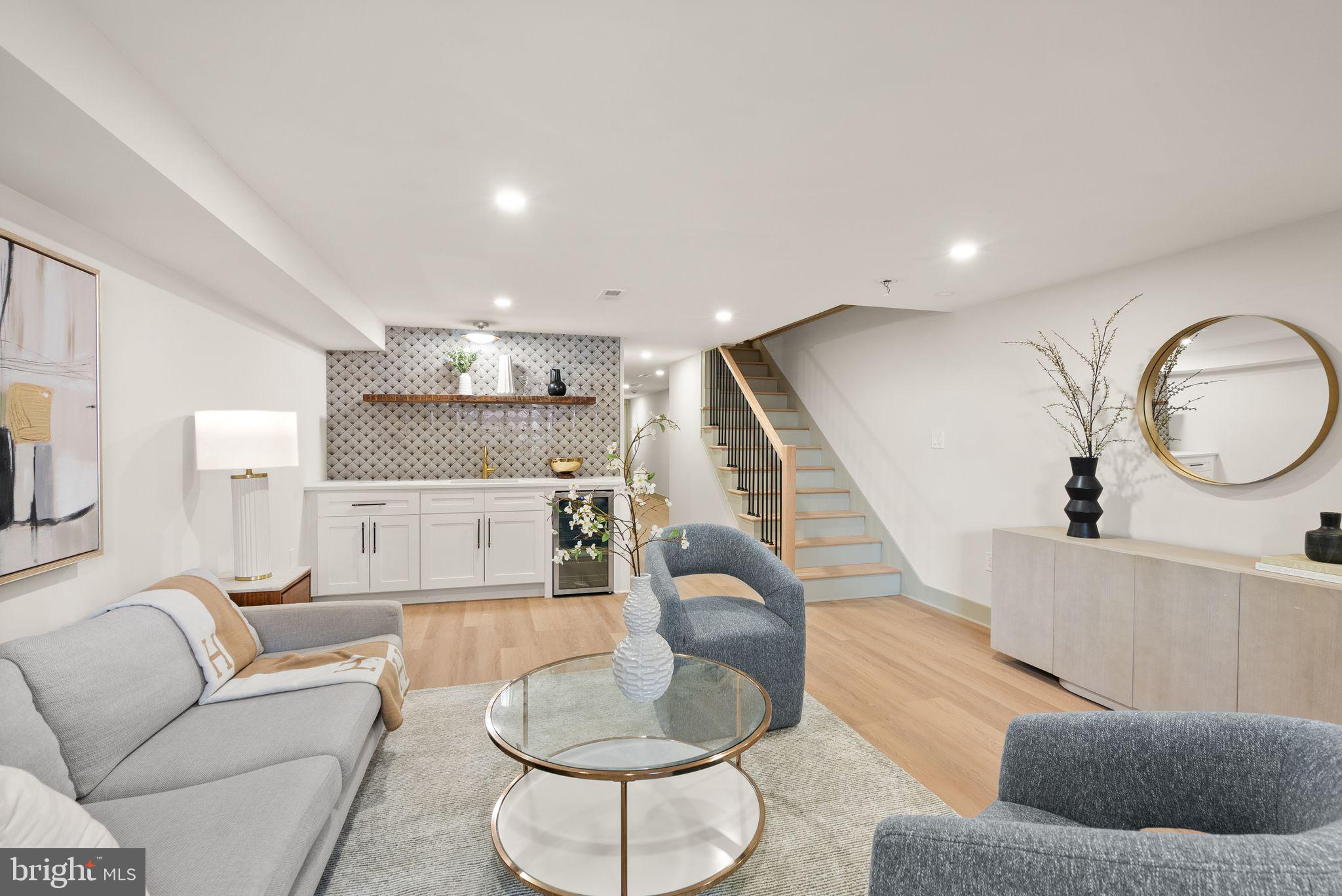 52 S Street Northwest Washington, DC 20001 - Photo 24 of 30 a living room with furniture and a wooden floor