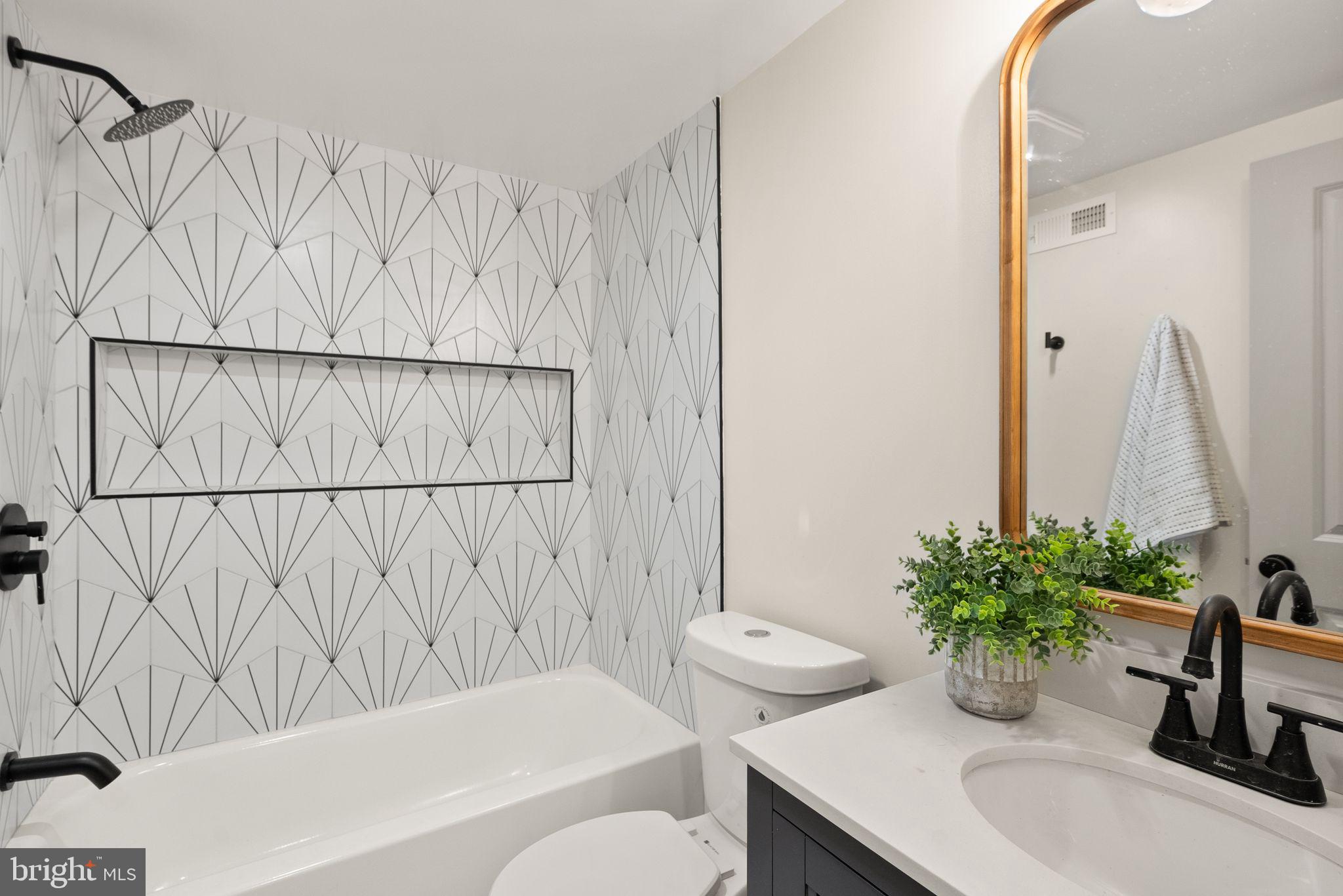 52 S Street Northwest Washington, DC 20001 - Photo 27 of 30 a bathroom with a sink toilet and shower