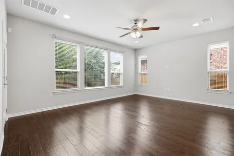 a kitchen with a sink stove and microwave
