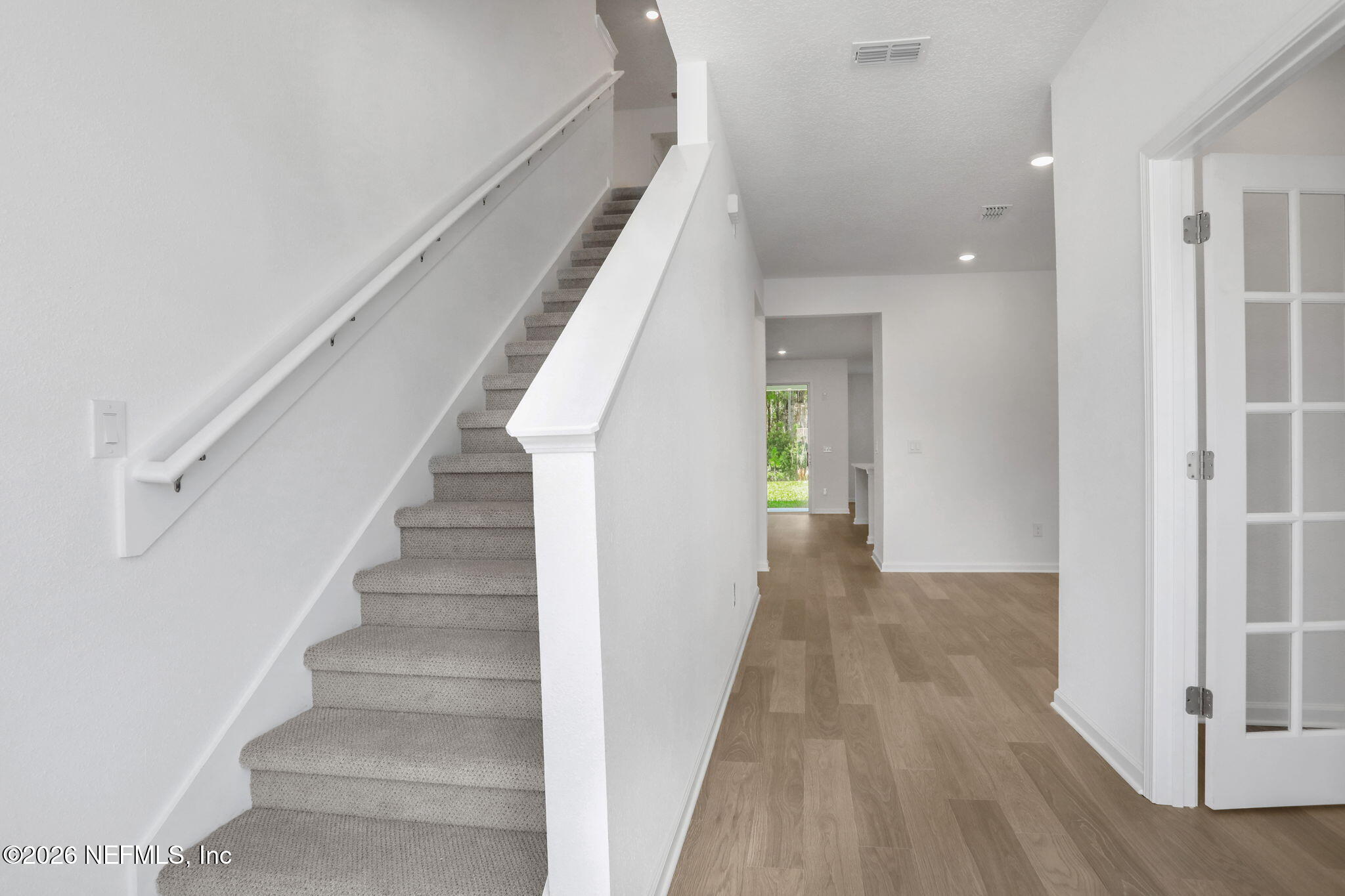 3154 Gadwall Road Orange Park, FL 32065 - Photo 3 of 10 a view of an entryway with wooden floor