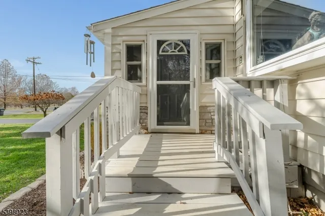 a view of a house with entrance and stairs