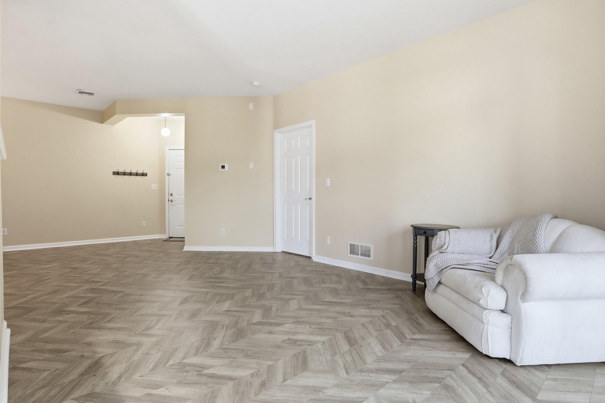 1010 Crest Way, Unit 103 York, PA 17403 - Photo 11 of 49 a view of a livingroom with a couch